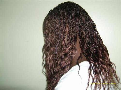 Braids avec les mèches bouclées