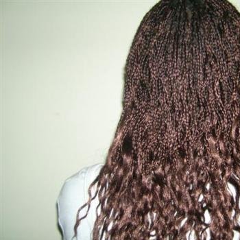 Braids avec les mèches bouclées