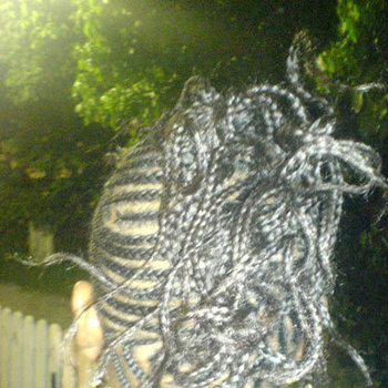 Coiffure tresses collées