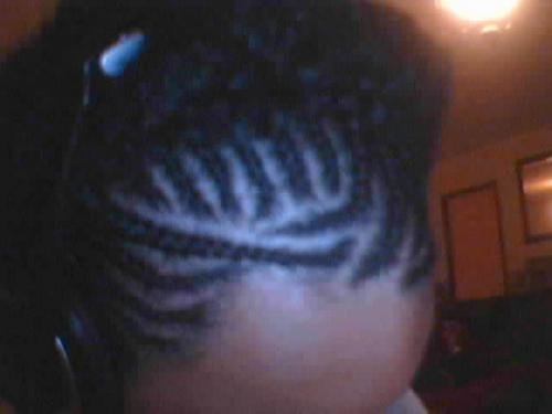 Coiffure tresses sur modèle masculin