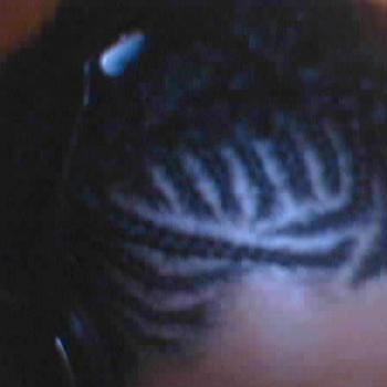 Coiffure tresses sur modèle masculin