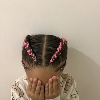 Deux nattes collées 