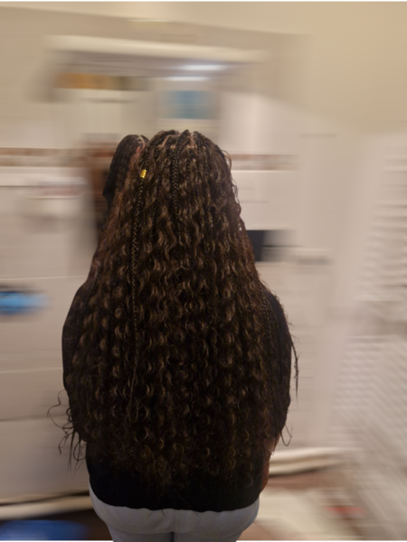 Goddess braid sur cheveux de type afro-métissé.