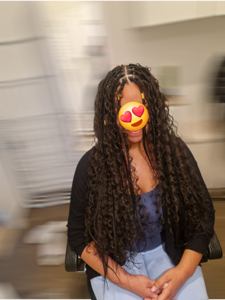 Goddess braid sur cheveux de type afro-métissé.