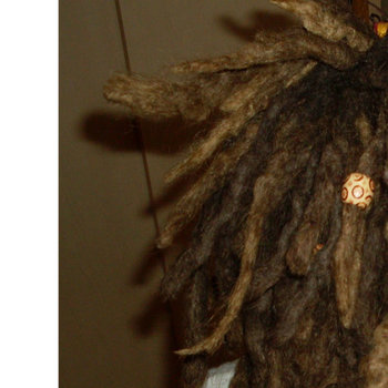 Retouche dreadlocks naturelles de Jade  au crochet 