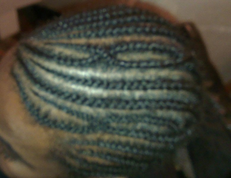 Tresses plaquées homme