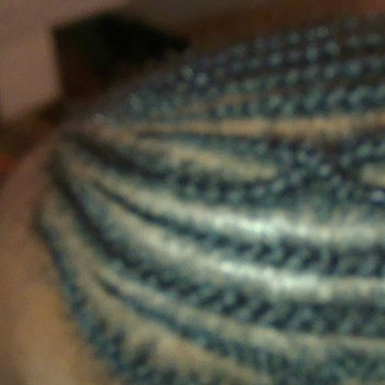 Tresses plaquées homme