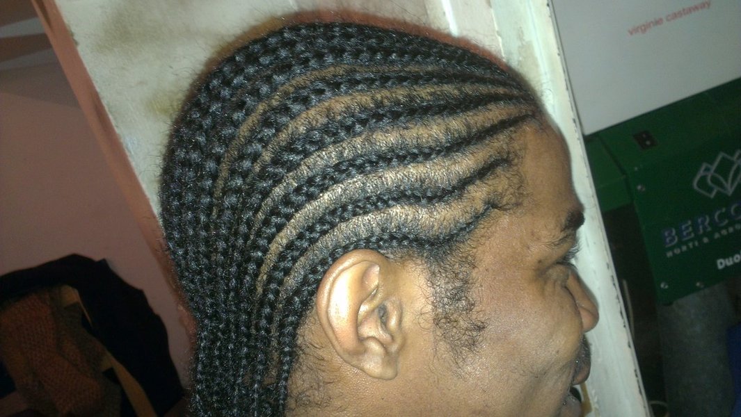 Tresses plaquées homme