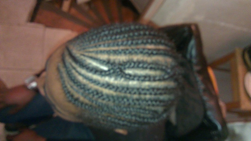 Tresses plaquées homme