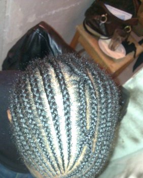 Tresses plaquées homme